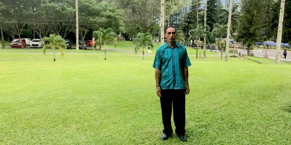 Petrus Tobolu meeting with Adventist Mission on the campus of Universitas Klabat, near Manado on Indonesia’s Sulawesi island. (Andrew McChesney / Adventist Mission)
