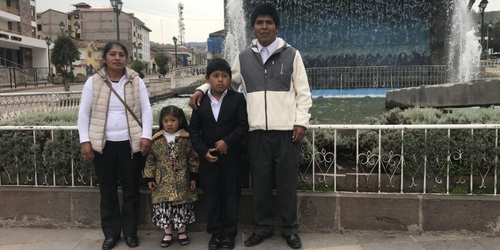 Cesar Manuel Condor Ttito, 10, with his family in Cusco, Peru. (Andrew McChesney / Adventist Mission)