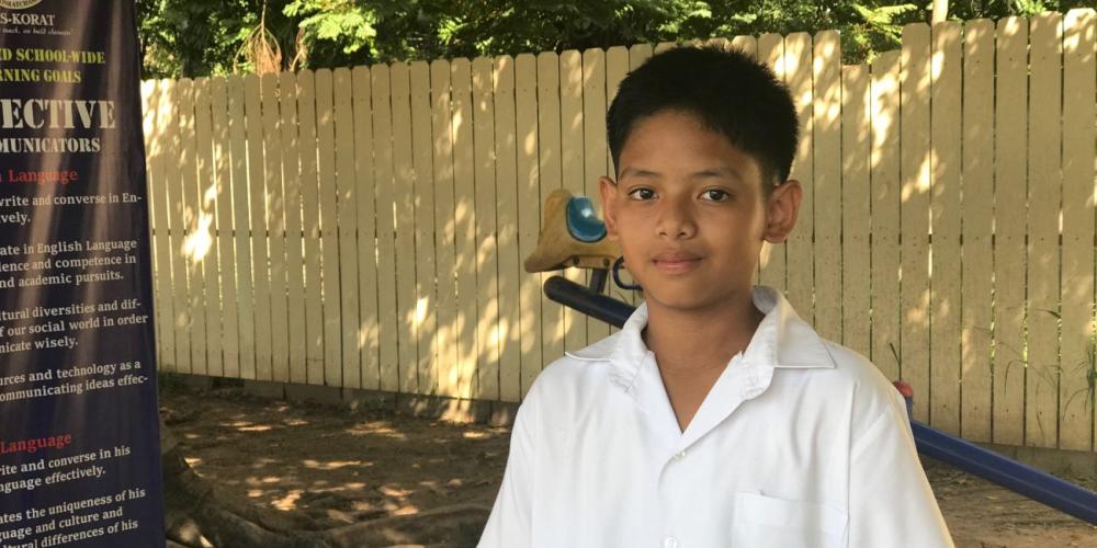 Johrel Milton P. Galube, 10, is happy with his new home and new school in Nakhon Ratchasima, Thailand. (Andrew McChesney / Adventist Mission)