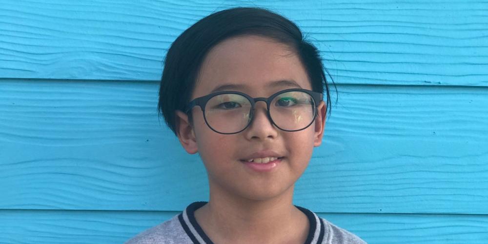 Lambeth Sriwattanapapha, 11, remembers seeing something “shiny” in the room and hearing a soft voice say inside him, “Go to church.” (Andrew McChesney / Adventist Mission)