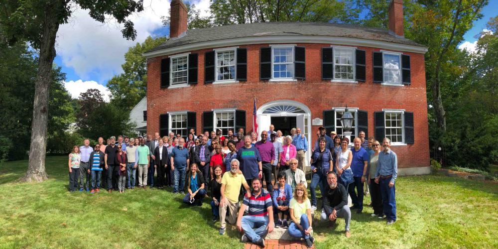 A group of about 75 General Conference leaders and spouses posing at the childhood home of Seventh-day Adventist pioneers Uriah and Annie Smith in West Wilton, New Hampshire, on Sept. 14, 2018. (Magdiel Pérez Schulz)